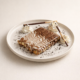 Chocolate swirled dessert with cream and sticks